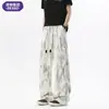 Calça jeans casual reta tie-dye estilo hip-hop americano para homens, calça longa de corte solto, calça jovem moderna de alta qualidade em preto e branco