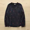 Colección Otoño 2026 Estilo Japonés Dibujos Animados Bordado Moño Holgado Cardigan para Mujer Cuello Alto Camisa de Manga Larga Venta al por Mayor
