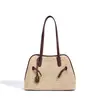 Bolsa de Ombro Única Tecida para Férias Design de Nicho de Luxo Primavera/Verão 2026 Bolsa de Axila Patchwork Grande Capacidade Transversal Feminina