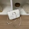 Lindo bolso de mano de nicho con estampado de gato de dibujos animados, bolso pequeño cuadrado cruzado, bolso de mujer de alta gama, bolso con cadena, bolso simple para mujer