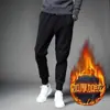 Calça de Veludo Camuflada de Inverno Espessada Cor Sólida Casual Versátil Preta Esportiva para Homens e Mulheres Versátil com Amarração na Barra Calça de Moletom de Trabalho Tendência