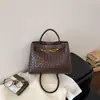 Bolso Kelly tejido con patrón vintage transfronterizo, bolso de hombro y bandolera casual de nicho para el día a día, bolso de mano moderno elegante y versátil