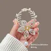 Novo Estilo Chinês Novo Clipe de Cabelo Bola de Flores Feminino Asas Borla Fivela de Rabo de Cavalo Parte de Trás da Cabeça Adorno de Cabelo