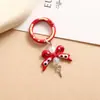 Nueva Cadena Creativa para Teléfono Móvil Caja Ciega de Perlas Colgante Lindo Llavero DIY Corbata de Moño de Aleación Joyería de Moño