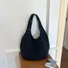 Elegante bolsa de mano estilo perezoso Xiaomi para mujer 2026 nueva bolsa ligera de gran capacidad de un solo hombro para el día a día y el trabajo bolsa de axila