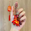 Llavero de Año Nuevo de Dibujos Animados Éxito Muñeca Linda para Bolso Colgante Pequeño Colgante Festivo del Festival de Primavera Regalo