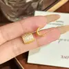 Pendientes de Botón Curvos de Circonita de Moda Más Vendidos Transfronterizos de Amazon para Mujer, Exquisitos y Elegantes, Pendientes de Gama Alta en Estilo Socialité