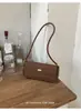 Moda Transfronteriza Retro Bolso de Axila para Mujer 2026 Nuevo Bolso Baguette de Nicho Francés Bolso de Hombro de Moda con Sentido de Alta Gama
