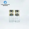 En stock Botella redonda recta de fondo grueso y hombro plano de 10 ml, cabeza de bomba, botella transparente para aceites esenciales, botella de esencia de base, botella para subdividir para viajes