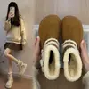 Botines de estilo nuevo con hebillas grandes, botas de nieve para mujer, engrosadas para el invierno 2026, zapatos de algodón afelpado, forrados de felpa, casuales y lindos