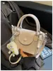 Otoño e Invierno Bolso Pequeño Retro para Mujer 2026 Nuevo Estilo Moda Versátil Bolso Cruzado Bolso de Mano para Viajes Bolso Dumpling Más Vendido