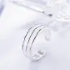 Estilo étnico joyería anillo tridimensional de tres líneas para mujer venta al por mayor joyería popular fábrica directa engaste plata lisa joyería hecha a mano