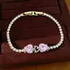 Pulsera con cierre de corazón de circonita chapada en oro real de 18k, pulsera de nicho de lujo ligero, joyería versátil simple y elegante al por mayor