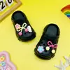 Nuevos zuecos infantiles florales rosa y amarillo transfronterizos con suelas gruesas para uso en exteriores, pantuflas de playa para bebé, sandalias de exterior