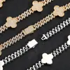 Pulsera de Cadena Cubana de Diamantes de Trébol de Cuatro Hojas con Hebilla de Resorte Hip Hop Transfronteriza Europea y Americana, Pulsera de Zirconia de Alto Nivel Versátil para Hombre