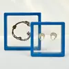 Caja de Exhibición de Película Pe Transparente Caja de Empaque Colgante Caja para Anillos Collares Joyería Pasador Insignia Caja de Regalo para Joyería