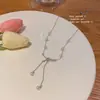 Collar de Acero de Titanio con Lazo Lujo Accesible Diseño de Nicho Ins Tendencia Versátil Elegante Cadena para Clavícula con Borla de Perla