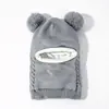 Conjunto de gorro y bufanda de invierno de venta caliente transfronteriza para niños, gorro con orejeras forrado de polar para bebés y gorro de una pieza tejido para niños