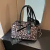 Maletín portátil con estampado de leopardo vintage (2024), bolso de mano de gran capacidad para uso diario, estilo coreano, diseño de nicho, bolso para la axila.