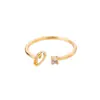 Anel de letra AliExpress 26 letras AZ banhado a ouro 18K anel neutro anel de dedo criativo joias por atacado
