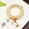 Pulsera de Semillas de Bodhi Amarillas tipo Custard Estilo Nacional con Colgante de Loto Doble Círculo Portátil para Niñas Juguete Cultural Pulsera de Cuentas Budistas Venta al por Mayor
