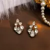 Aretes Turquesa Bohemios Palma Búho Bronce Tallado Geométricos Atrapasueños Borla de Pluma Pendientes Largos