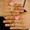 Anillo de combinación de flor de perla barroca transfronteriza europea y americana para mujer, anillo de lava de metal plisado de moda retro.