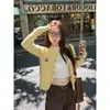 Cárdigan suéter rojo para mujer, nuevo abrigo de estilo coreano de alta gama para otoño e invierno 2026, top holgado de punto trenzado con cuello redondo