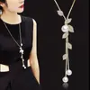 Versión coreana del nuevo collar cadena para suéter de temperamento simple para mujer cadena larga Joker ropa otoño e invierno borla Colgante de joyería venta al por mayor