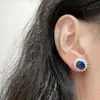 Transmisión en vivo transfronteriza anillo de cobre incrustado con circonita Amazon nicho azul zafiro anillo de cristal cuadrado circonita diamante comercio electrónico transfronterizo