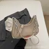 Bolsa de Mão Feminina Fashion 2026 Novo Modelo Versátil de Alta Qualidade Bolsa de Ombro Grande Capacidade Casual para o Dia a Dia Tendência