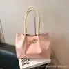 Bolsa de Mão Feminina de Luxo Leve e de Alta Qualidade 2026 Novo Modelo Grande Capacidade Bolsa de Ombro para o Dia a Dia Bolsa Tote Casual Fashion Tendência
