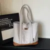 Bolsa de mano transfronteriza de gran capacidad con diseño simple, nueva moda de verano 2026, bolso de hombro versátil de alta calidad