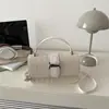 Moda Verão 2026 Nova Bolsa de Ombro Estilo Coreano com Estampa de Xadrez e Padrão de Pedra, Bolsa de Mão Versátil com Toque de Luxo, Bolsa de Ombro para Venda por Atacado
