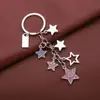 Nuevo llavero de pentagrama con incrustaciones de diamantes, dulce accesorio de estrella para mochila, colgante para bolso, adorno de llavero para coche