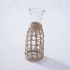 Cubierta de flor de botella de paja tejida a mano hueca para taza de té, cubierta protectora retro creativa para taza de té, comercio exterior transfronterizo