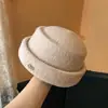 Sombrero pequeño de lana estilo Hepburn boina elegante sombrero tipo cubo sombrero simple versátil sombrero de copa redonda sombrero moderno sombrero de azafata de vuelo a la moda