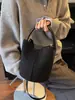 Bolso de mano vintage transfronterizo para mujer, nuevo bolso cubo de nicho de moda 2026, bolso de hombro cruzado elegante y de alta gama