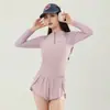 Nuevo traje de baño deportivo casual de dos piezas, diseñado para ocultar imperfecciones y crear un efecto adelgazante, con mangas largas, un conjunto de dos piezas, protección solar y un estilo lindo, juvenil y modesto