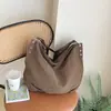 Bolso grande de color liso, estilo relajado y casual para mujer, nuevo modelo 2026, bolso de hombro de alta apariencia, bolsa de mano casual para el día a día