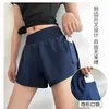Nuevos shorts deportivos transfronterizos, shorts de correr de dos piezas falsos, secado rápido, pantalones de yoga anti-exposición con bolsillos, shorts de fitness para mujer