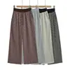 Chal de Mujer Coreano Rayado con Cordón al Frente + Top Camisola Corta de Cintura Alta + Pantalones Casuales Rectos de Pierna Ancha Rayados con Parches