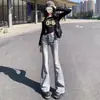 Jeans de Pierna Ancha Acampanada Micro con Cintura Alta Nuevos para Otoño e Invierno 2025 para Mujer, Ajustados, Elásticos, Borde Crudo, Retro, Casual