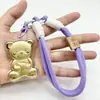 Novo Estilo Shuibei Ouro Imitação Lote de Urso Morango Lotso Chaveiro Pingente de Celular Pingente de Bolsa Desenho Animado Estilo Simples