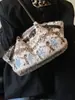 Bolsa de Felpa Transfronteriza para Mujer, Bolsa de Gran Capacidad, Nuevo Bolso Tote Versátil de Hombro y Axila para Primavera 2026 para el Trabajo y los Viajes