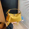 Bolso de Mano de Lujo Ligero Estilo Coreano Transfronterizo para Mujer 2026 Nuevo Verano Bolso Cubo de Gama Alta Bolso de Hombro Cruzado Versátil