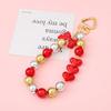 5 cuentas redondas de acrílico electrochapado UV de AliExpress, con forma de corazón de melocotón y lazo, hechas a mano, para pendientes y colgantes de joyería.