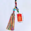 Colgante para coche en el mismo estilo que los borlas de cinco colores del Tíbet, cuerda colgante de campana del dios de la riqueza de cinco vías, recuerdo de atracción turística de Yunnan