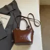 Bolsa Feminina 2025 Nova Moda Luxo Acessível Nicho Bolsa de Mão Casual Ombro Transversal Saco Saco de Balde Bolsa de Alta Qualidade