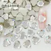 Blanco boutique de fondo plano con forma especial taladro para uñas taladro K9 imitación Hua Zi no se cae el fondo mini tamaño pequeño decoraciones para uñas al por mayor